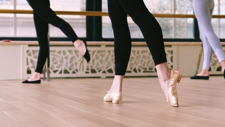 Female dancers legs in pointe shoes